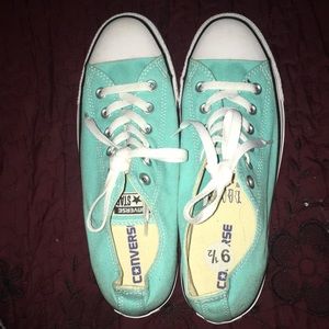 Teal green converse shoes
